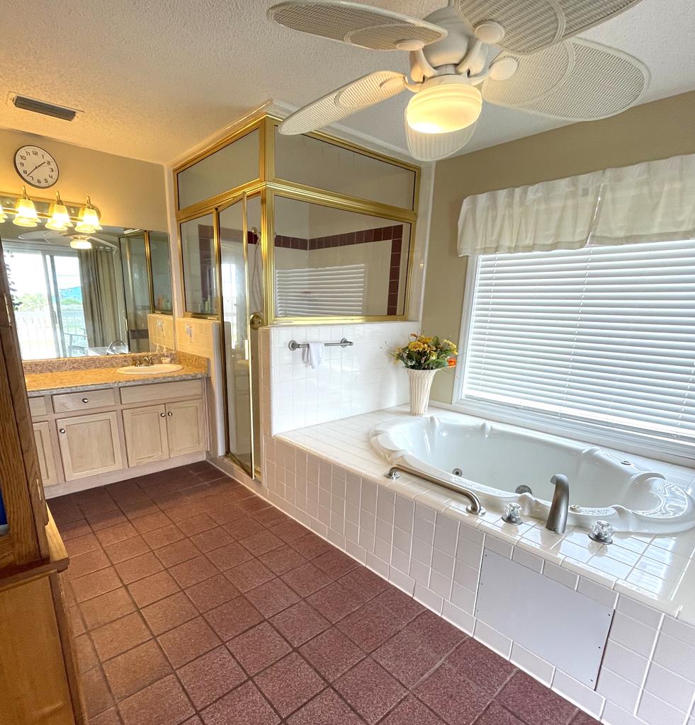 Walk in shower and double vanity in master bath.